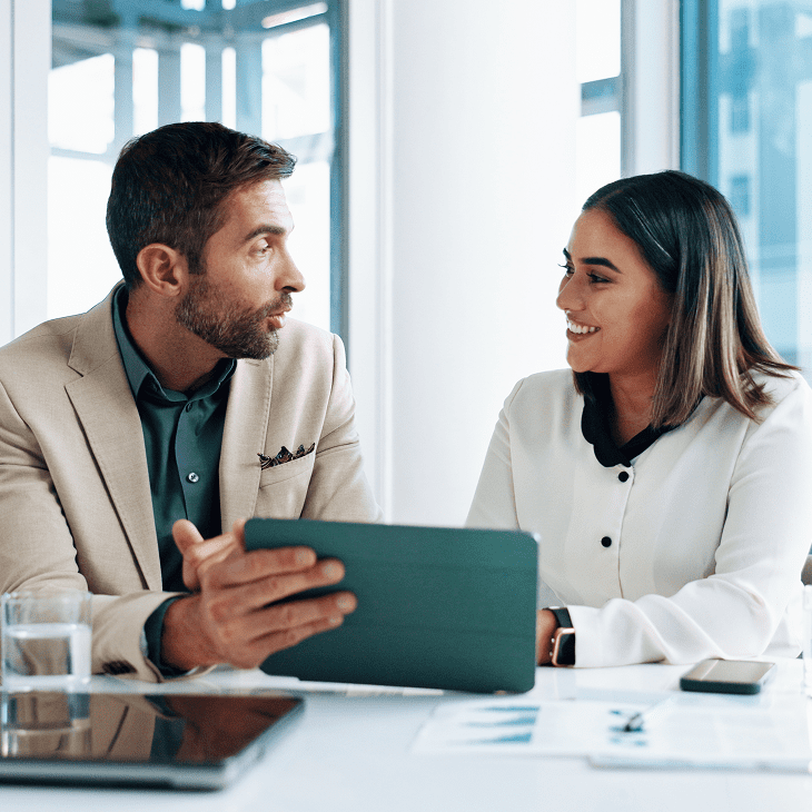 Business meeting discussion with tablet